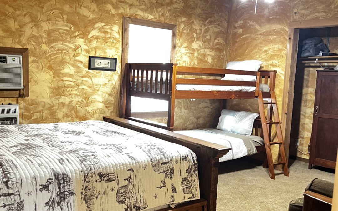 Bedroom 3 – Queen, Twin Bunk Beds, & Futon